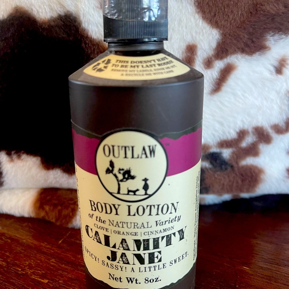 NEW! Whiskey Outlaw Calamity Jane lotion. Spicy! Sassy! Net weight 8 oz.